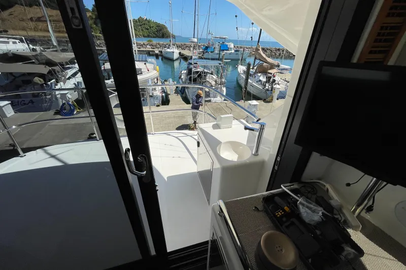  Yacht Photos Pics 2011 Maritimo 56 Cruising Motoryacht docked at marina, view from interior.