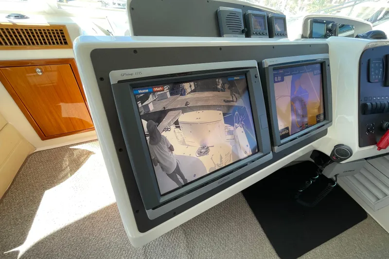  Yacht Photos Pics Control panel of 2011 Maritimo 56 Cruising Motoryacht with dual Garmin displays.