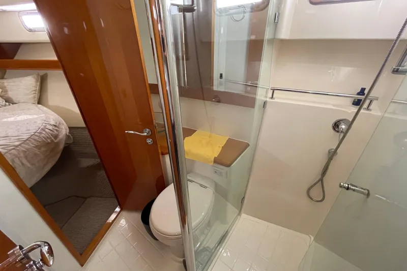  Yacht Photos Pics Bathroom interior of 2011 Maritimo 56 Cruising Motoryacht with shower and toilet.