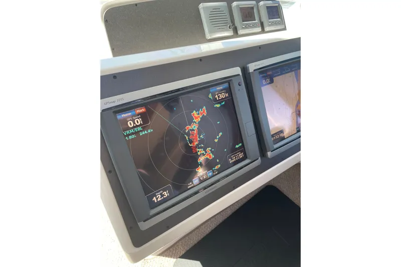  Yacht Photos Pics Navigation screens on a 2011 Maritimo 56 Cruising Motoryacht dashboard.