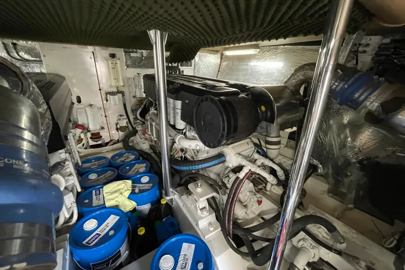  Yacht Photos Pics Engine room of 2011 Maritimo 56 Cruising Motoryacht with visible components and equipment.