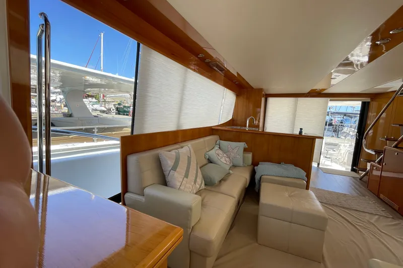  Yacht Photos Pics Luxurious interior of 2011 Maritimo 56 Cruising Motoryacht with plush seating and elegant decor.