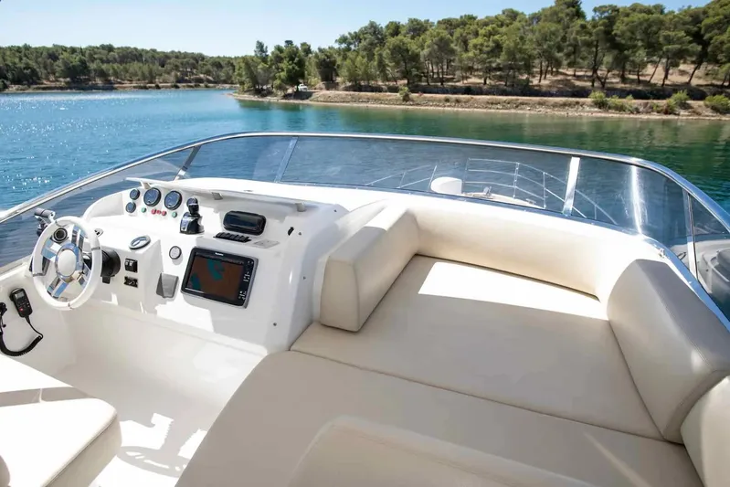 My Laura Yacht Photos Pics Luxurious 2015 Azimut Fly 60 yacht interior with scenic water view.