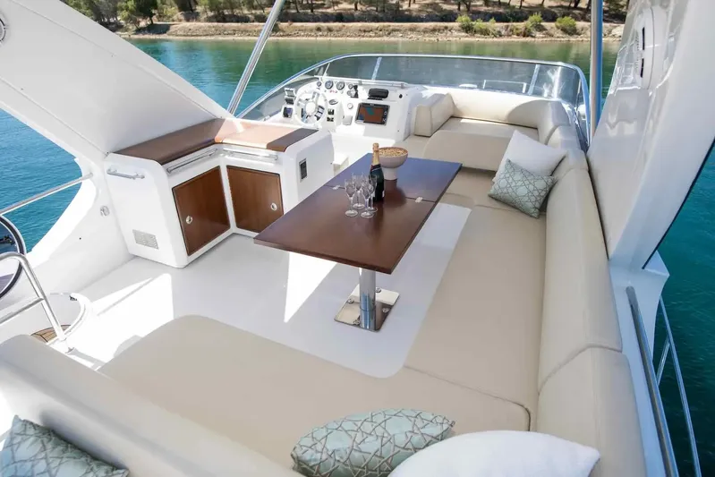 My Laura Yacht Photos Pics Luxurious 2015 Azimut Fly 60 yacht interior with elegant seating and dining area.