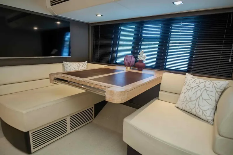 My Laura Yacht Photos Pics Luxurious interior of 2015 Azimut Fly 60 yacht with elegant seating and decor.
