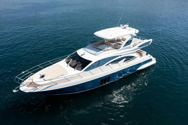 My Laura Yacht Photos Pics Luxurious 2015 Azimut Fly 60 yacht cruising on calm blue waters.