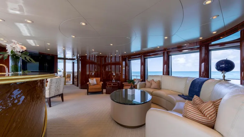 Touch Yacht Photos Pics Luxurious yacht interior with ocean view, featuring elegant seating and modern decor, Custom Louisbourg 2004.