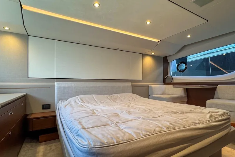  Yacht Photos Pics Luxurious interior of 2019 Princess F55 yacht with elegant bedroom design.