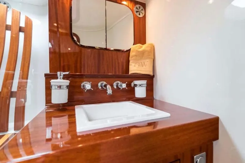 Visionnaire Yacht Photos Pics Luxurious wooden bathroom interior on 2010 J Craft Torpedo 42 yacht.