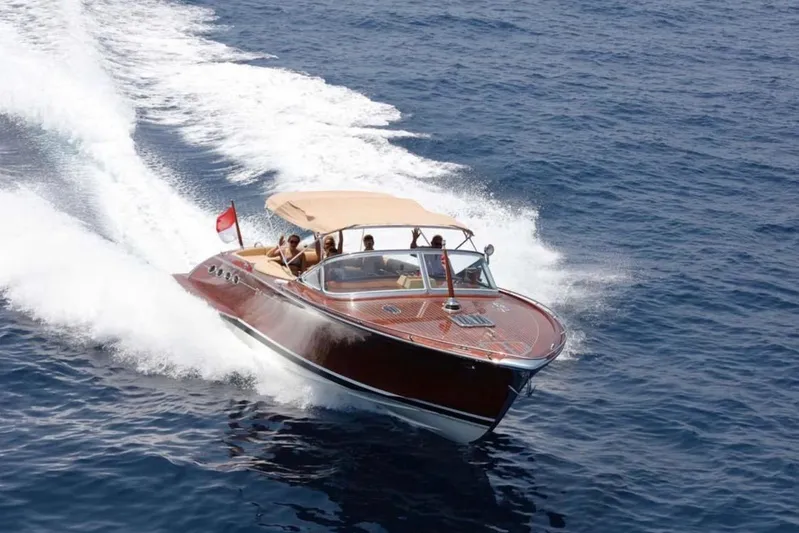 Visionnaire Yacht Photos Pics Luxurious 2010 J Craft Torpedo 42 motor yacht cruising on open sea.