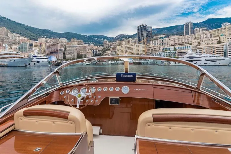 Visionnaire Yacht Photos Pics Luxurious J Craft Torpedo 42 yacht interior with cityscape and marina view, 2010 model.