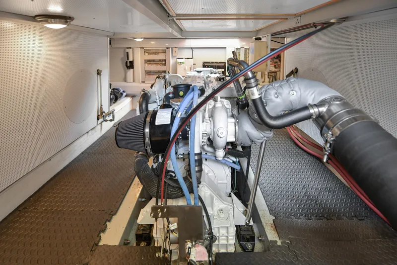 Island Harmony Yacht Photos Pics Engine room of 2012 North Pacific NP 38 Sedan with visible machinery and components.