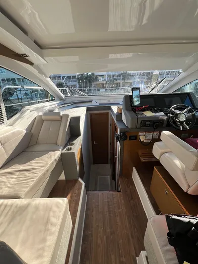  Yacht Photos Pics Interior of 2018 Cruisers Yachts 42 Cantius with modern seating and helm.