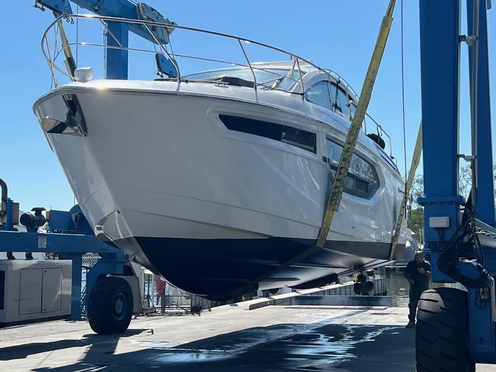  Yacht Photos Pics 2018 Cruisers Yachts 42 Cantius being lifted by a boat hoist.