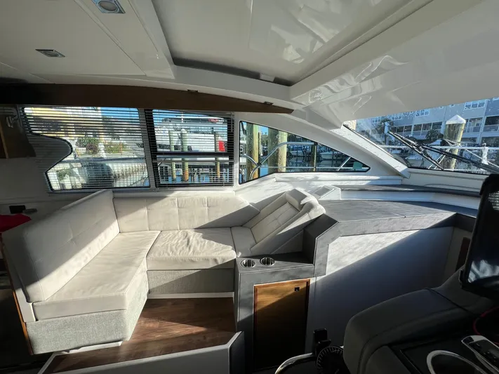  Yacht Photos Pics Luxurious interior of 2018 Cruisers Yachts 42 Cantius with plush seating and modern design.