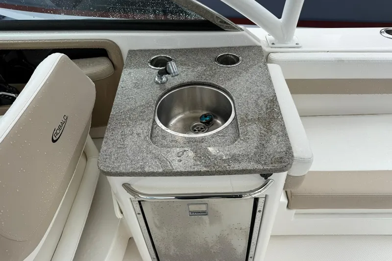  Yacht Photos Pics 2024 Robalo R317 Dual Console boat with wet bar and stainless steel sink.