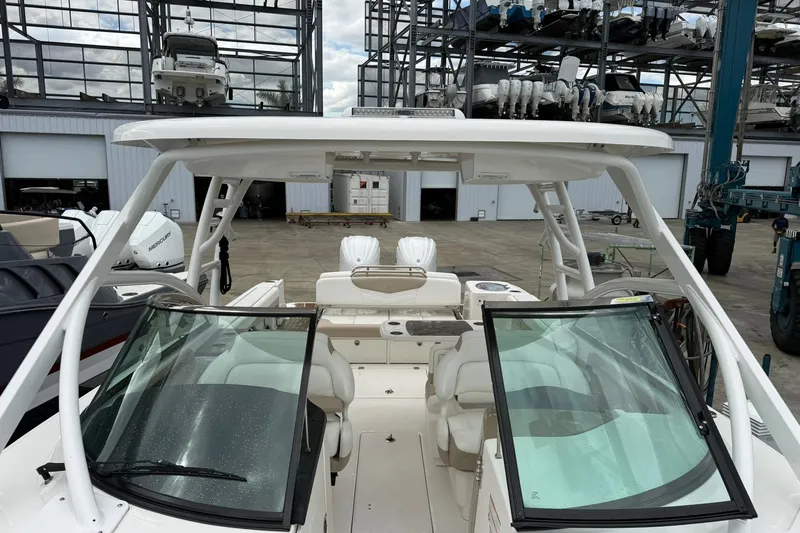  Yacht Photos Pics 2024 Robalo R317 Dual Console boat with spacious seating and modern design.