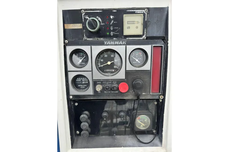 Giksea Yacht Photos Pics Control panel of a 1989 Franchini Atlantide 42 yacht with Yanmar engine gauges.