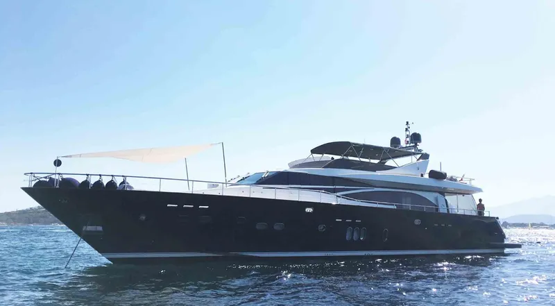  Yacht Photos Pics Luxury 2006 Couach 3000 Fly yacht cruising on open water.