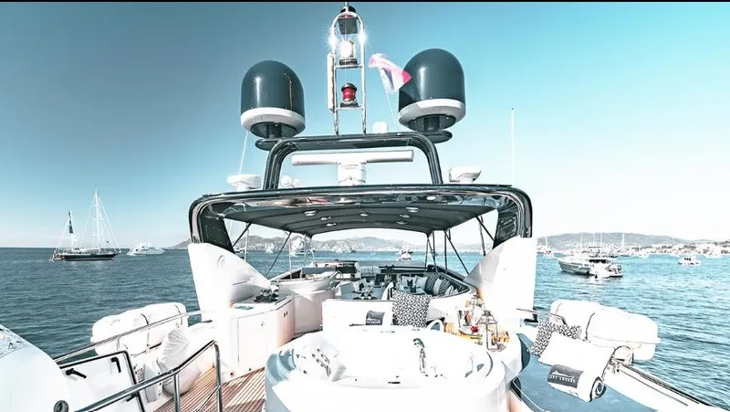  Yacht Photos Pics Luxurious 2006 Couach 3000 Fly yacht with spacious deck and scenic ocean view.