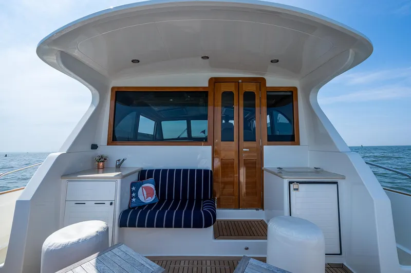 Duet Yacht Photos Pics 2017 Grand Banks 44 Eastbay SX yacht with elegant seating and ocean view.