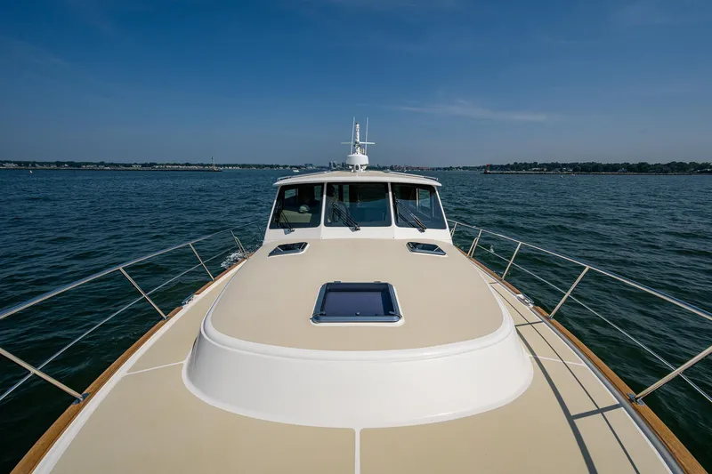 Duet Yacht Photos Pics 2017 Grand Banks 44 Eastbay SX yacht cruising on open water.