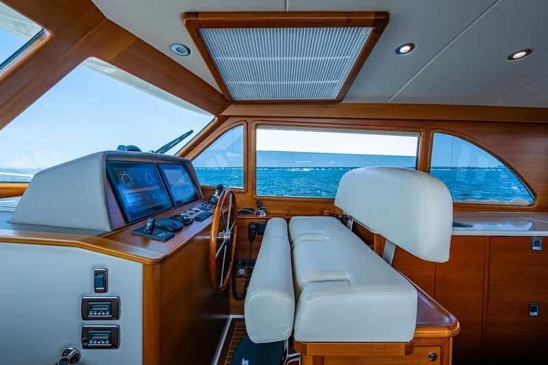 Duet Yacht Photos Pics Interior helm of 2017 Grand Banks 44 Eastbay SX yacht with ocean view.