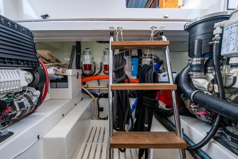 Duet Yacht Photos Pics Engine room of 2017 Grand Banks 44 Eastbay SX with equipment and ladder.