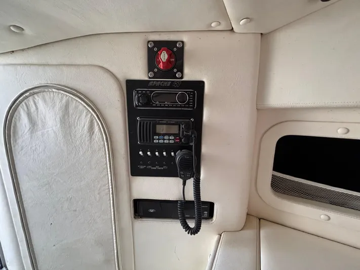  Yacht Photos Pics Interior of a 1994 Apache 47 Fire Water boat with radio and control panel.