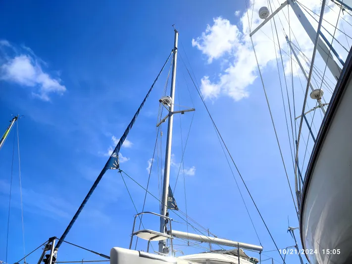 Tortuga Yacht Photos Pics Lagoon 380 catamaran mast against a clear blue sky, 2001 model.