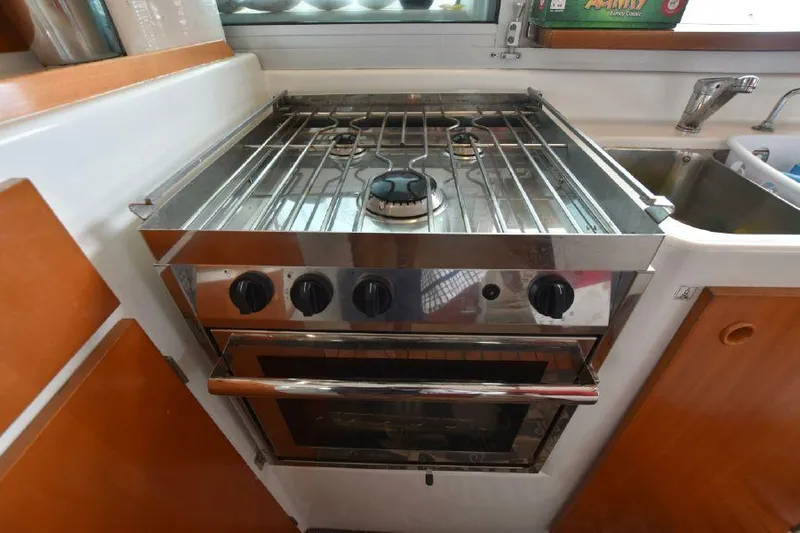 Tortuga Yacht Photos Pics Stainless steel stove and oven in 2001 Lagoon 380 yacht kitchen.