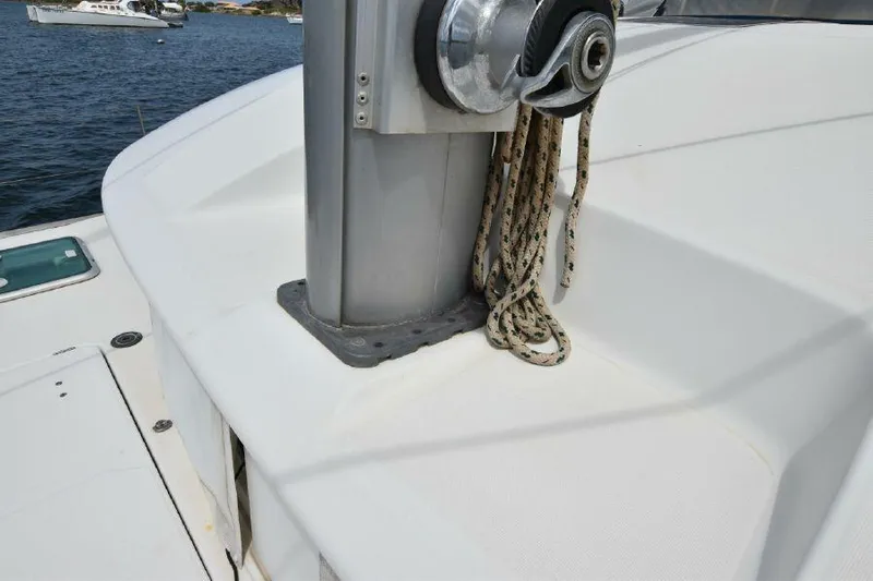 Tortuga Yacht Photos Pics Lagoon 380 catamaran deck with mast and ropes, 2001 model, on water.