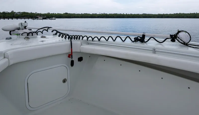  Yacht Photos Pics 2018 Yellowfin 36 Offshore boat interior with coiled cables, calm water in the background.