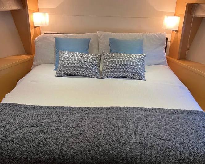 The Best Day Ever Yacht Photos Pics Luxurious bedroom interior of 2013 Prestige 500 S yacht with elegant bedding and soft lighting.