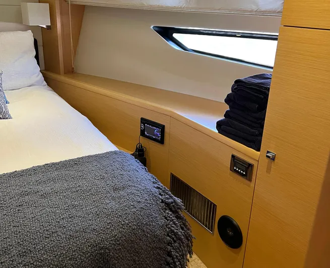 The Best Day Ever Yacht Photos Pics Cozy cabin interior of 2013 Prestige 500 S yacht with bed and window view.