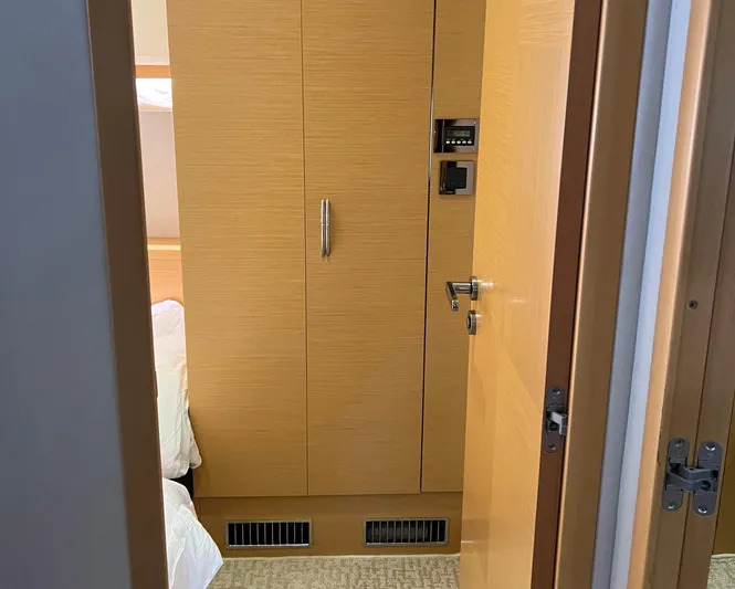 The Best Day Ever Yacht Photos Pics Interior of 2013 Prestige 500 S yacht showing wooden cabinetry and door.