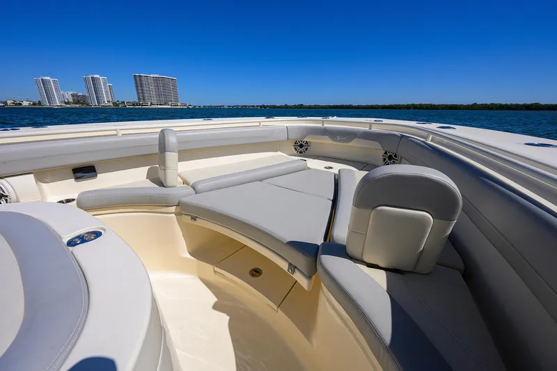 W/seakeeper Yacht Photos Pics 2023 Scout 355 LXF boat interior with luxurious seating and ocean view.