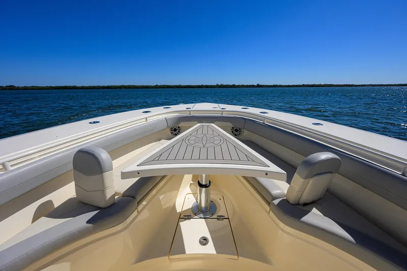 W/seakeeper Yacht Photos Pics 2023 Scout 355 LXF boat with sleek deck design on open water.