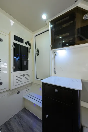 W/seakeeper Yacht Photos Pics 2023 Scout 355 LXF interior with modern cabinetry and sleek design.