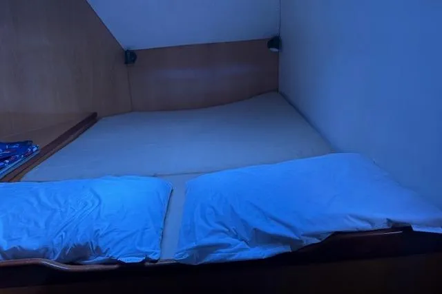  Yacht Photos Pics Cozy cabin interior of 2004 Soubise Plaisance Freydis 46 with double bed.