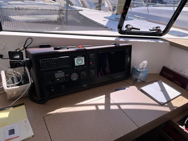 Tri It Yacht Photos Pics Navigation station on 2018 NEEL 51 yacht with control panel and desk accessories.