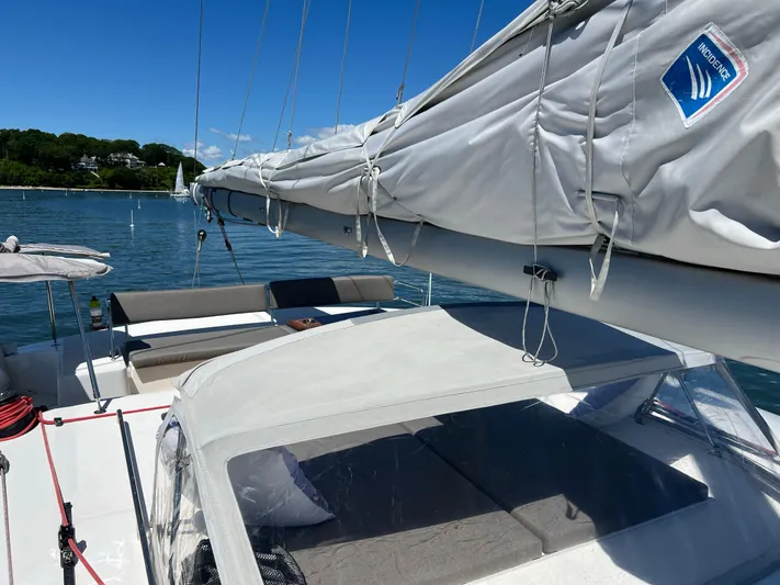 Tri It Yacht Photos Pics Sailing yacht NEEL 51, 2018 model, docked with sails covered, clear sky.