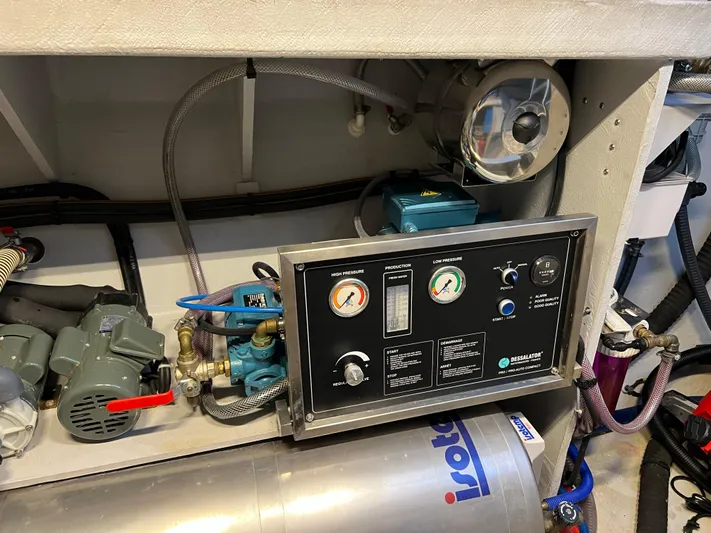 Tri It Yacht Photos Pics Control panel and machinery inside a 2018 NEEL 51, featuring gauges and pipes.