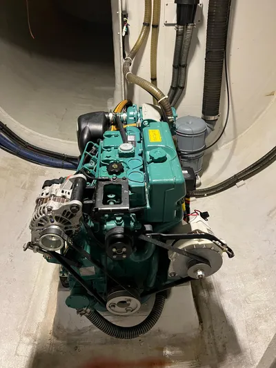 Tri It Yacht Photos Pics Engine of a 2018 NEEL 51, showcasing mechanical components and wiring.