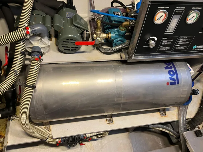 Tri It Yacht Photos Pics Engine room of a 2018 NEEL 51 with mechanical components and gauges.