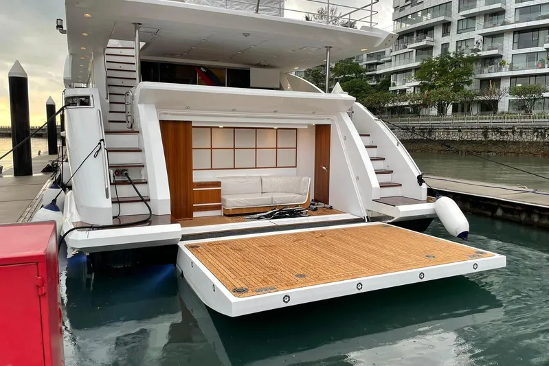  Yacht Photos Pics Luxury yacht Azimut Grande 32 Metri 2022, docked with open deck and seating area.