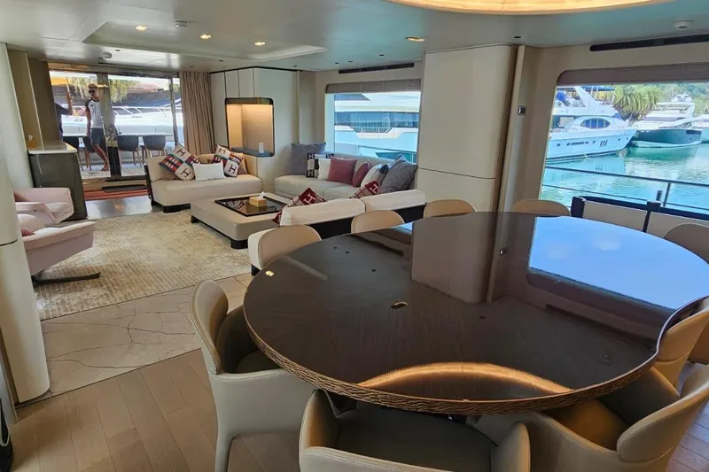  Yacht Photos Pics Luxurious interior of 2022 Azimut Grande 32 Metri yacht with elegant dining and seating areas.