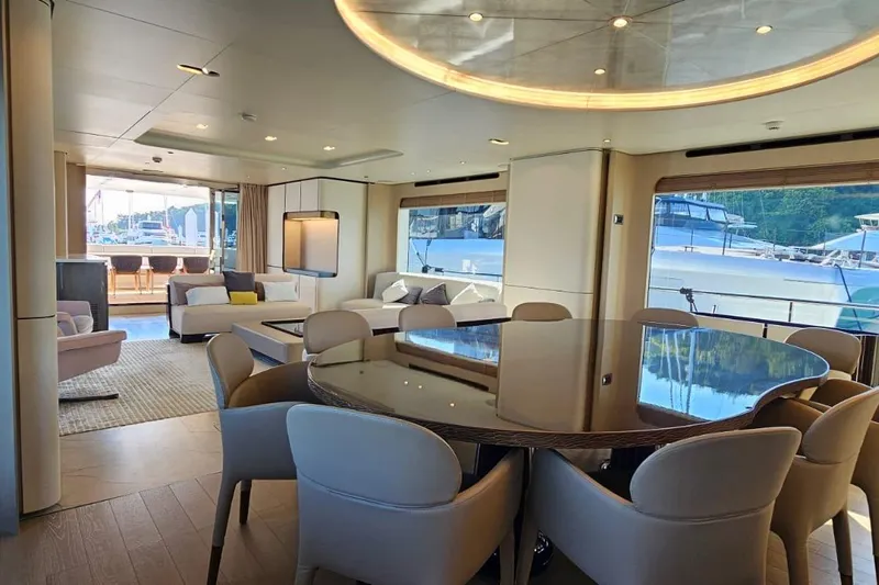  Yacht Photos Pics Luxurious interior of 2022 Azimut Grande 32 Metri yacht with elegant dining area.