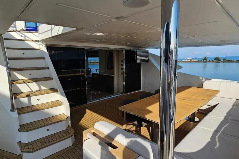  Yacht Photos Pics Luxurious Azimut Grande 32 Metri yacht deck with seating and ocean view, 2022 model.