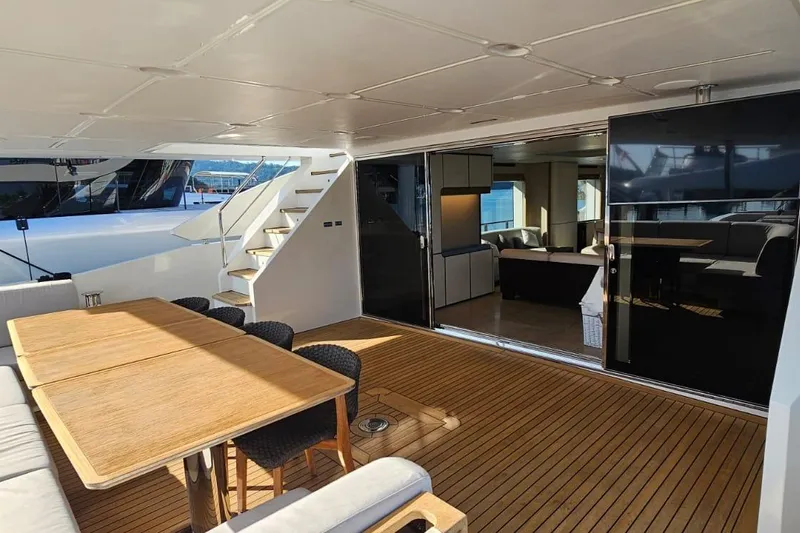  Yacht Photos Pics Luxurious Azimut Grande 32 Metri yacht interior with elegant dining area, 2022 model.